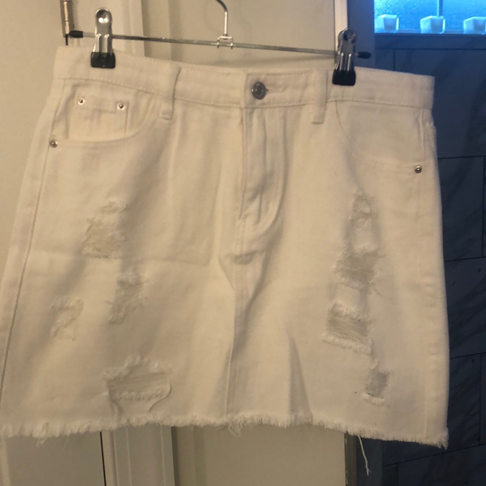 Brand new size medium distressed high waisted jean skirt